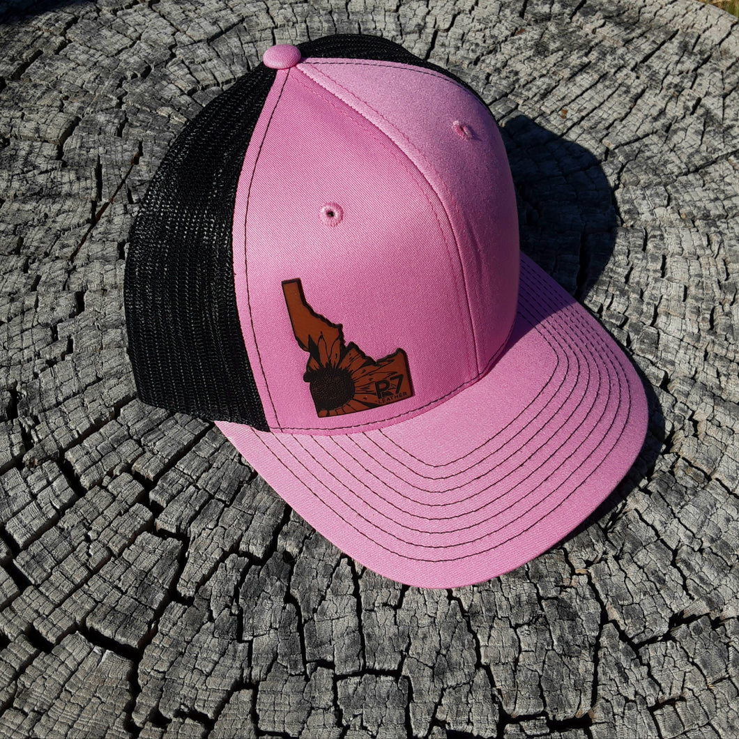Pink and black hat